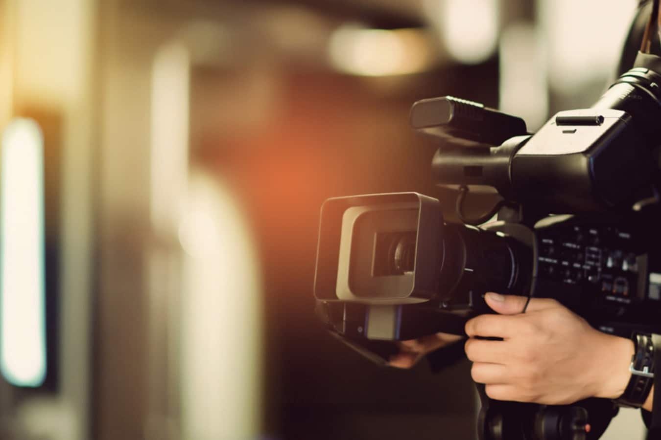 A professional videography camera set up for capturing high-quality video footage, ideal for events and media production.